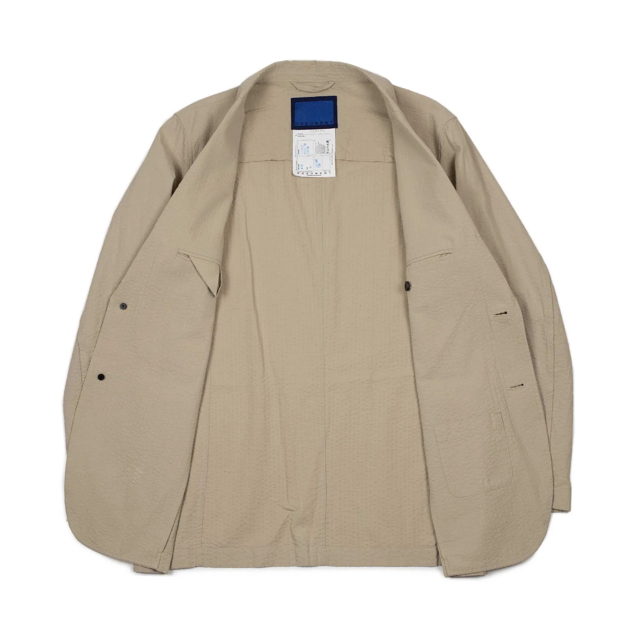 Single breasted jacket in beige cotton seersucker